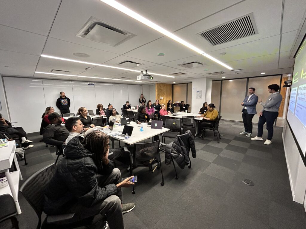 Representatives from Dow Jones, Barron's, and the Wall Street Journal trained NYCPS financial literacy instructors on investing